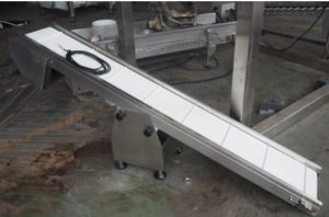 Finish product feed out conveyor