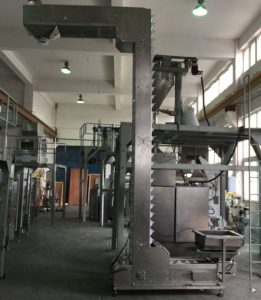 Z-shape degerter powder feeding system Z-muotoinen degerterijauhejärjestelmä